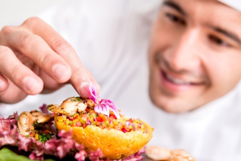 Chef plating food