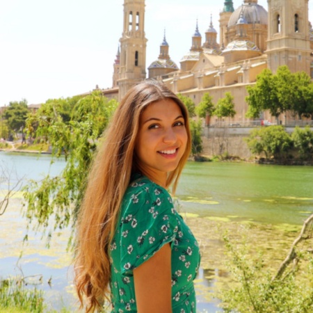 Tourist as the Ebro river goes through the city of Zaragoza, Aragon