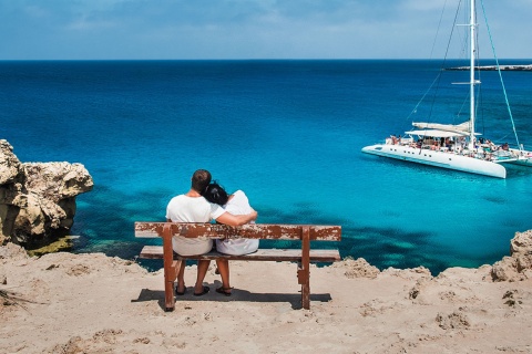 Couple gazing at the sea in the Balearic Islands