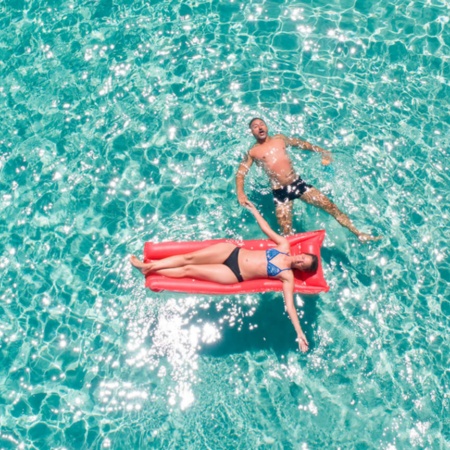 Couple enjoying the beach in Formentera