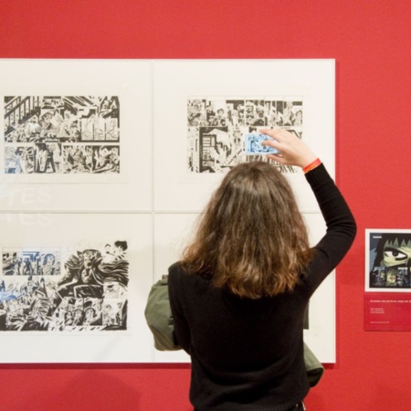 Tourist visiting an exhibition at the MNAC in Barcelona, Catalonia