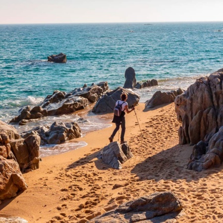 Ausflügler in Platja d'Aro. Costa Brava, Girona