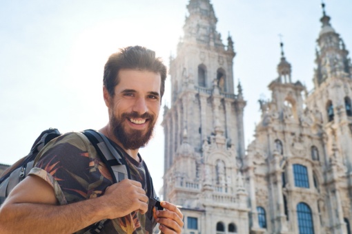 Pilgrim before the cathedral of Santiago de Compostela