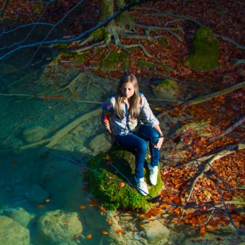 Tourist at the source of the Urederra river in the Urbasa y Andía Natural Park, Navarre