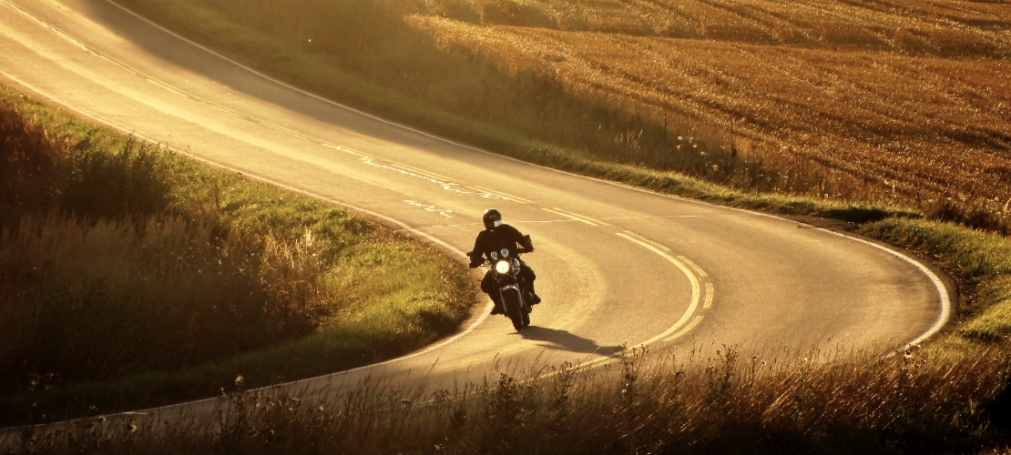 Motorcyclist riding on a road