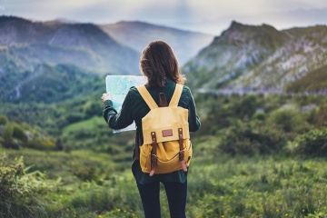 Girl with a map in the Basque Country