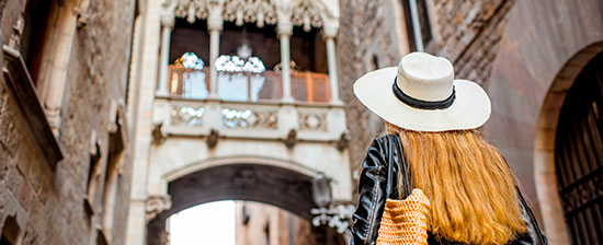 A tourist in Barcelona's Gothic Quarter