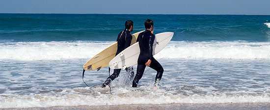 Surfer am Strand