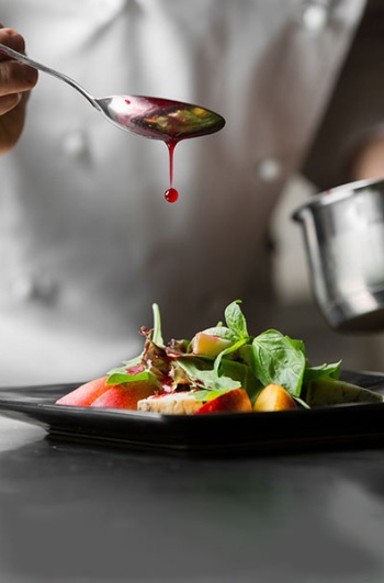 Chef plating food