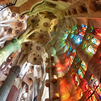 View of the ceiling and stained glass inside the Sagrada Familia, Barcelona