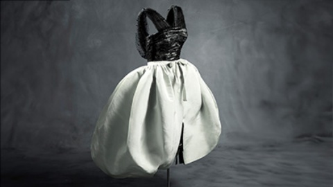 Set consisting of dress and overskirt. Made in the Paris workshops and presented in the 1956 winter collection