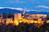 General view of the Alhambra at dawn, in Granada (Andalusia)