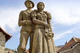 Sculpture of the traditional “chesco” dress in Hecho (Huesca, Aragon)