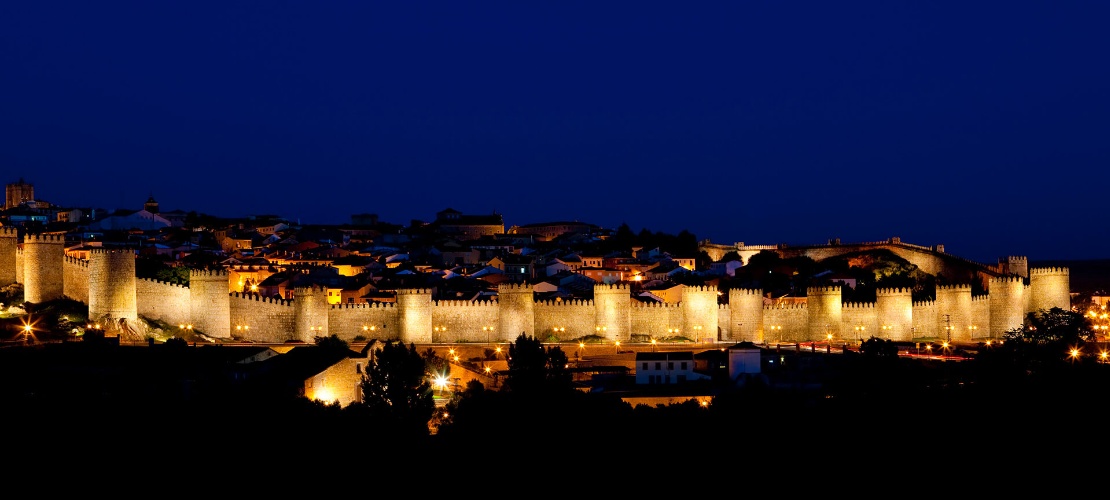 Avila city walls by night