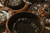 Tasting dishes at the Lamprey Festival in Arbo (Pontevedra, Galicia)