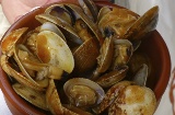 Cazuela de almejas (clam casserole), one of the traditional dishes at the Seafood Festival in O Grove (Pontevedra, Galicia)