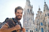 Pilgrim before the cathedral of Santiago de Compostela