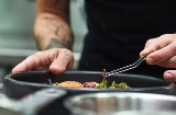 Chef plating food