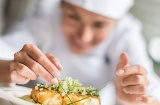 Chef plating food