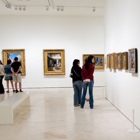 Room with visitors inside the museum